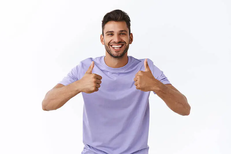 guy giving two thumbs up after visiting our Northridge dentist
