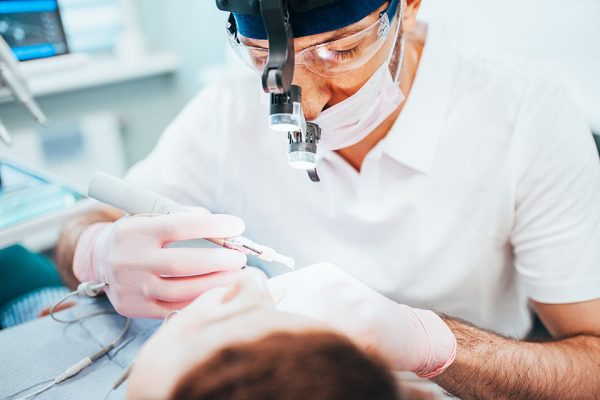 dentist performing treatments