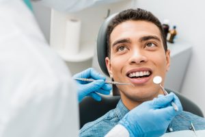 man visiting the dentist