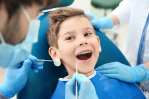 young boy at the dentist